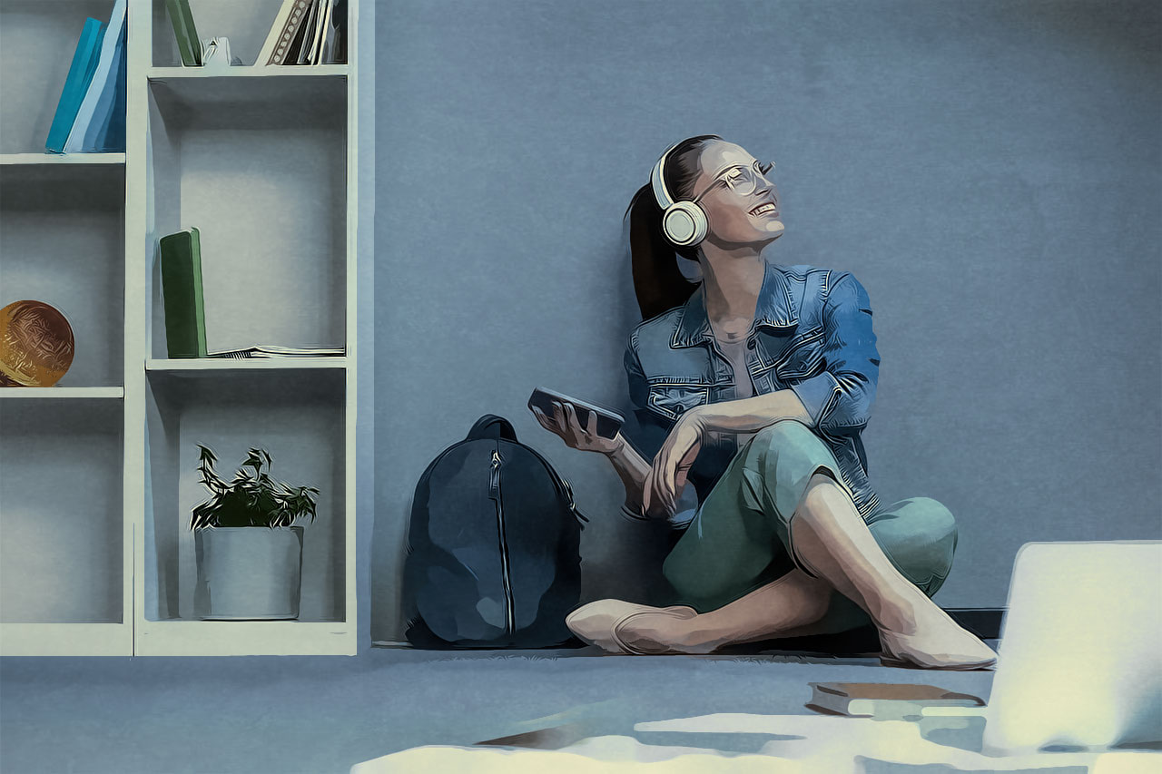 Young woman listening to music in headphones